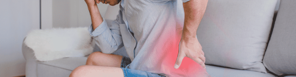 Illustration of a person experiencing back pain, highlighting affected areas.
